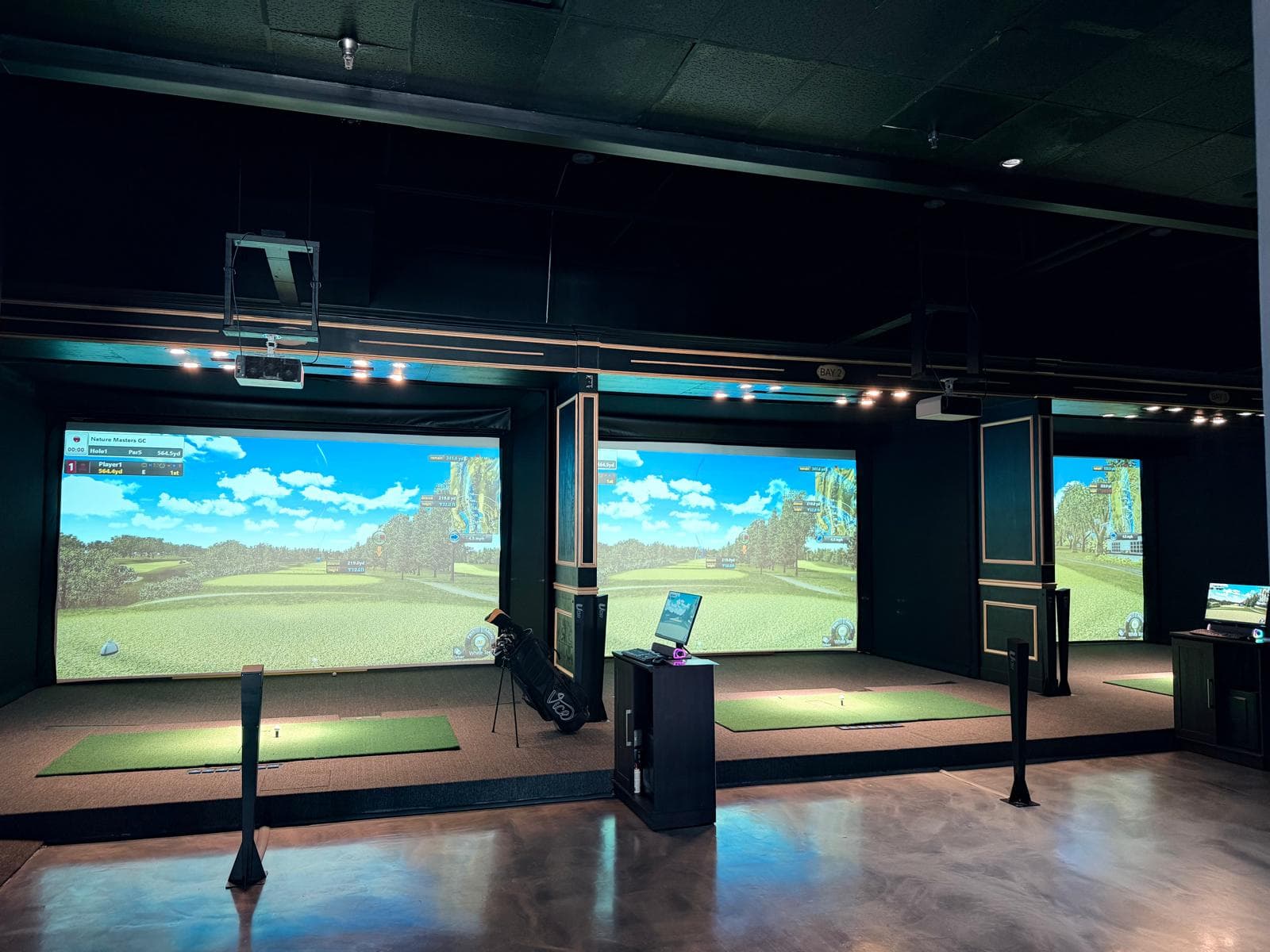 Billiards table and golf simulator at Home Bar Chicago
